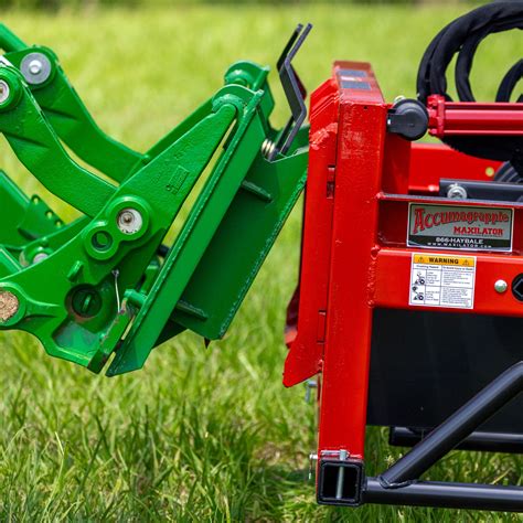 maxilator bale splitter with universal skid steer mount|MXE.